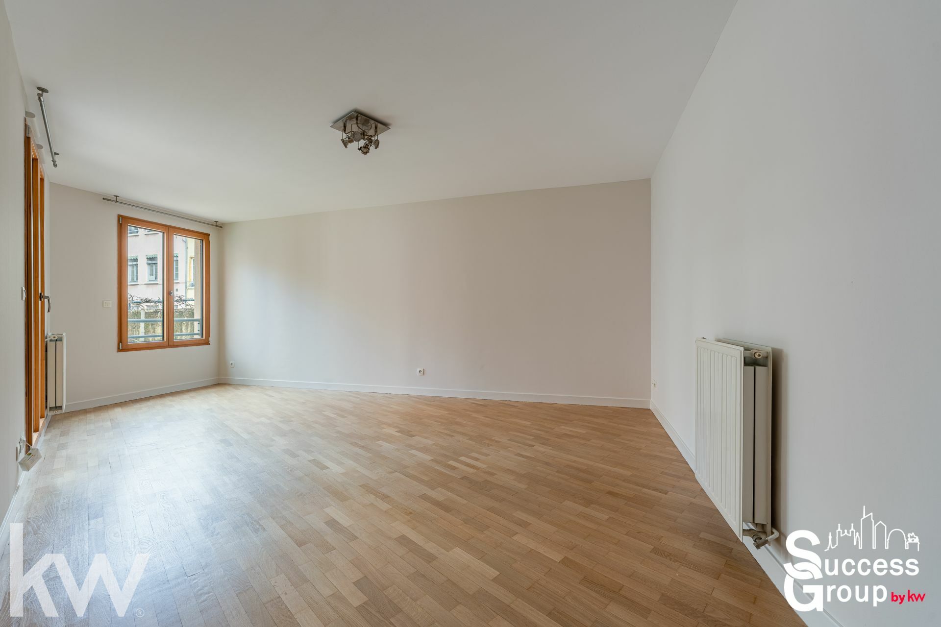LYON 01 – Appartement 2 pièces de 57 m² avec balcon