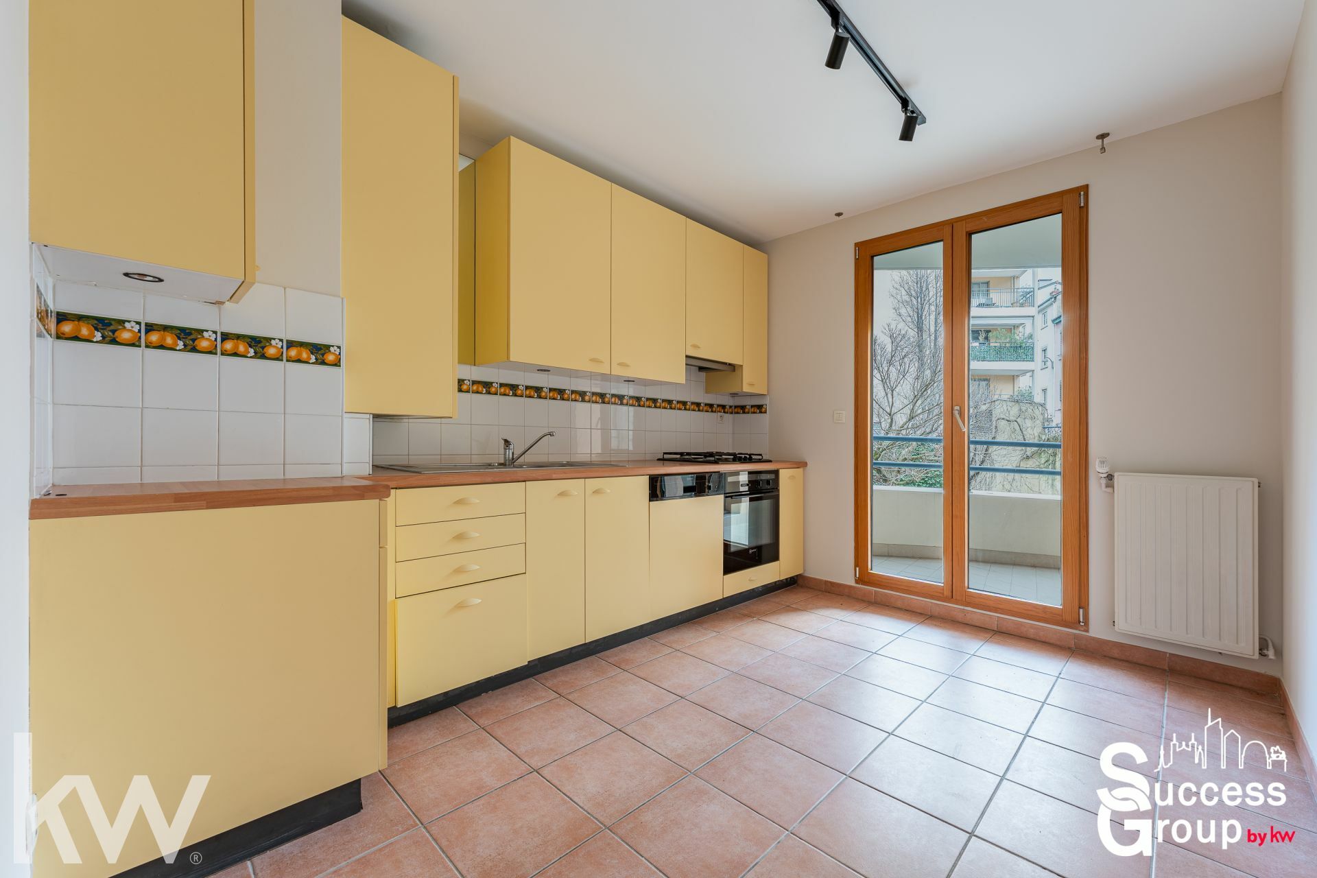 LYON 01 – Appartement 2 pièces de 57 m² avec balcon