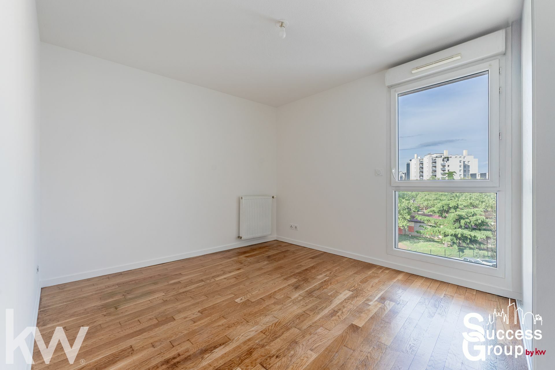 VÉNISSIEUX – Appartement 4 pièces de 84 m² avec terrasse et garage