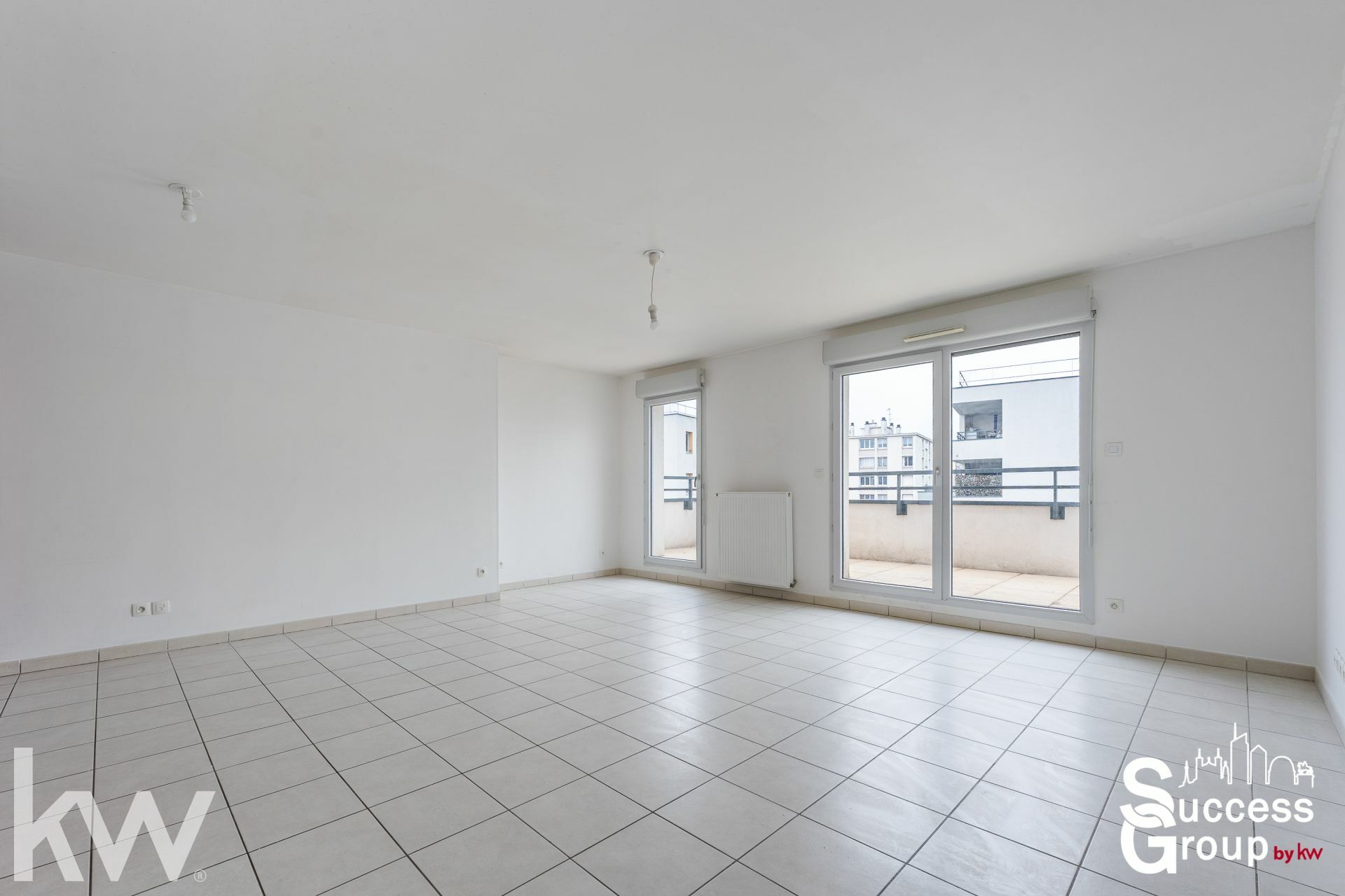 LYON 08 – Appartement T4 de 78 m² avec terrasse, balcons et stationnement